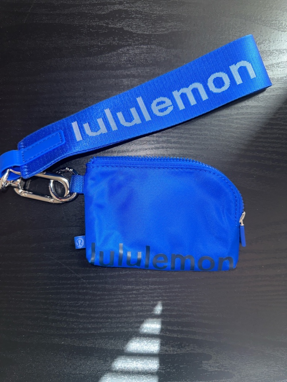 lululemon cobalt blue wristlet coin pouch with branded strap